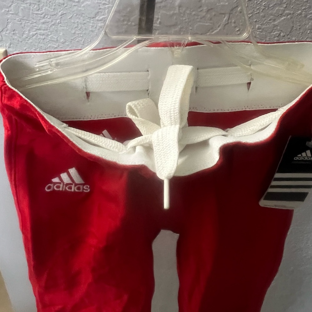Adidas Performance.. new with tags Men’s size small pants with waist drawstring